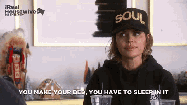 a woman wearing a hat that says soul