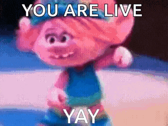 a troll from trolls is dancing with the words you are live yay