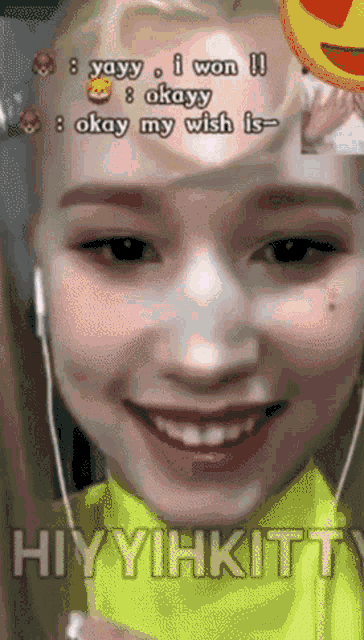 a close up of a woman 's face with the words hiyyihkitt on it