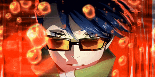 a close up of a person 's face with glasses and a red background