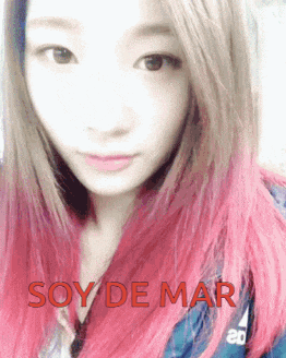 a woman with pink hair and the words soy de mar on the bottom right