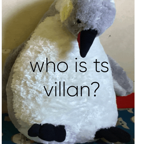 a stuffed penguin with the words " who is ts villan " written on it