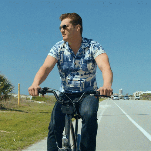 Riding A Bike Jon Pardi GIF - Riding A Bike Jon Pardi Tequila Little Time Song GIFs