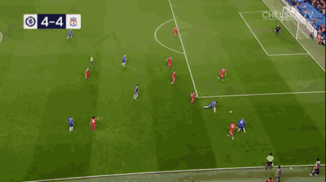 a soccer game between chelsea and liverpool is being played