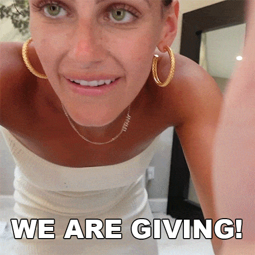 a woman taking a selfie with the words " we are giving " above her