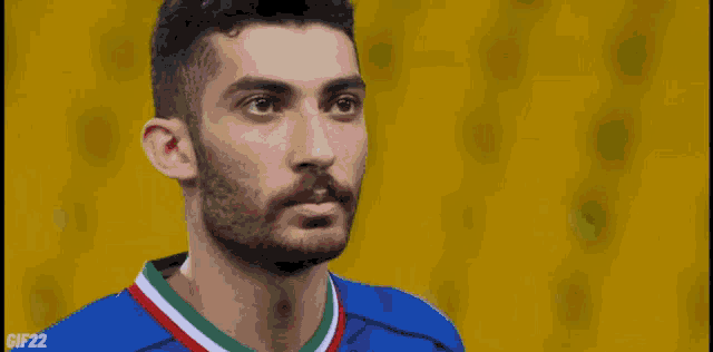 a pixel art of a man 's face with the number 22 on the bottom