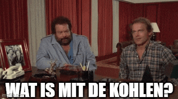 two men are sitting at a desk and one of them is asking what is mit de kohlen ?