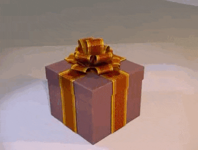 a purple gift box with a gold ribbon and bow on it .