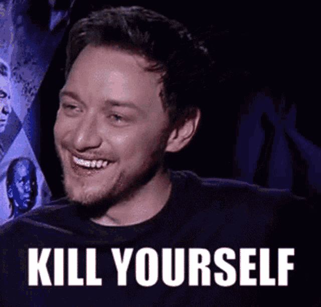 a man with a beard is smiling with the words `` kill yourself '' written below him .