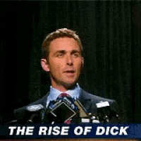 a man in a suit and tie is giving a speech at a podium with the words the rise of dick behind him