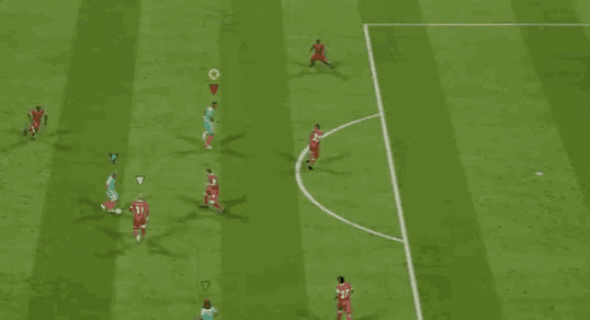 a group of soccer players are playing a game on a green field