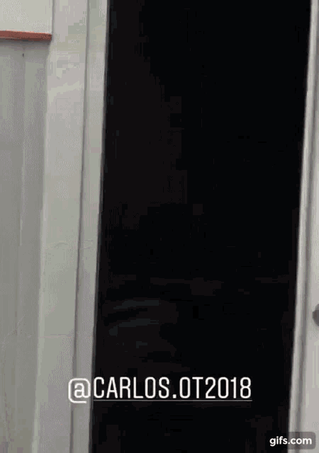 a picture of a window with the words carlos.ot2018 written on it