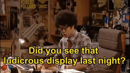 a man sits at a desk with the words did you see that ludicrous display last night on the bottom