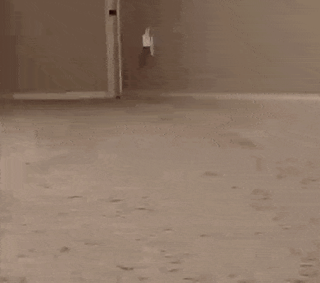a man in a red pajama top is doing push ups on the floor