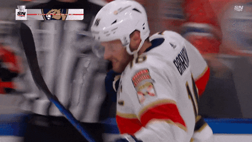 a hockey player with the name brooks on the back of his jersey