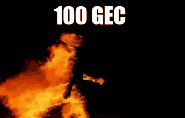 a person is standing in front of a fire with the words 100 gec written on the bottom .
