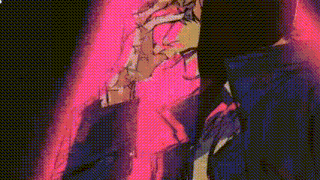 a close up of a person 's legs in a pink light .