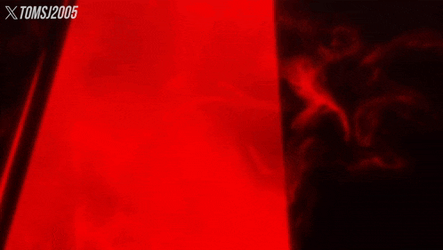 a red and black background with the letters toms written on it