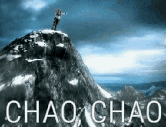 a person standing on top of a snow covered mountain with the words chao chao written below them