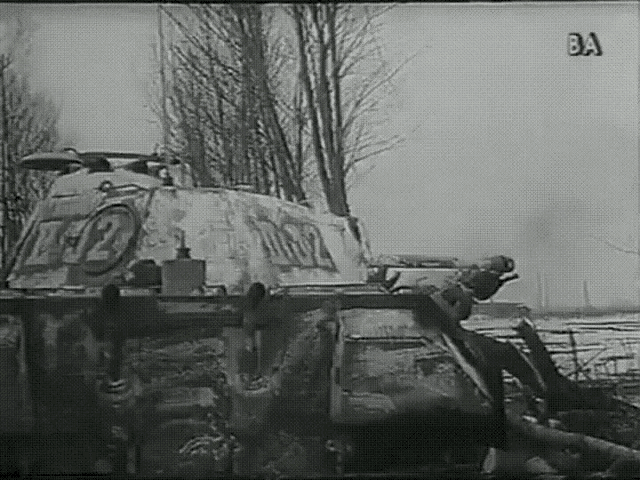 a black and white photo of a tank with the letters ba on the bottom right