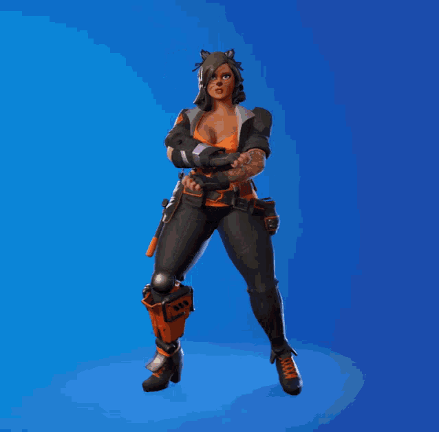 a female video game character is dancing with her fist in the air