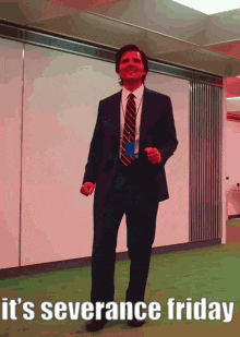 a man in a suit and tie is dancing with the words it 's severance friday behind him