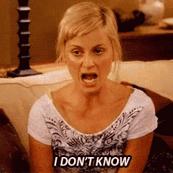 a woman is sitting on a couch with her mouth open and says i don 't know