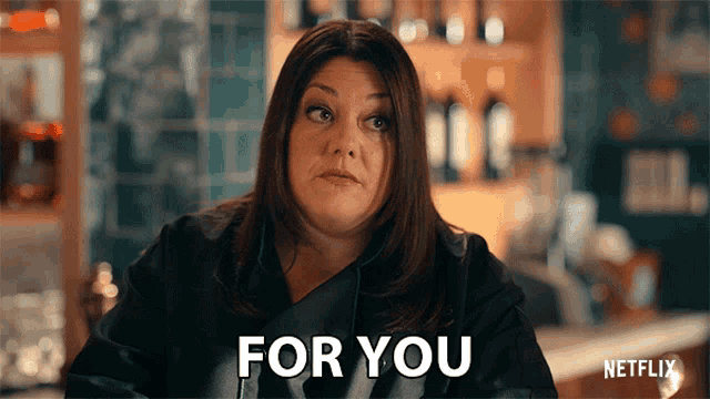 a woman says for you in front of a netflix sign