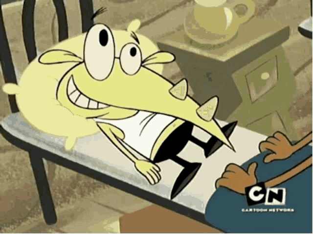 a cartoon character is laying on a bed with the cn logo on the bottom