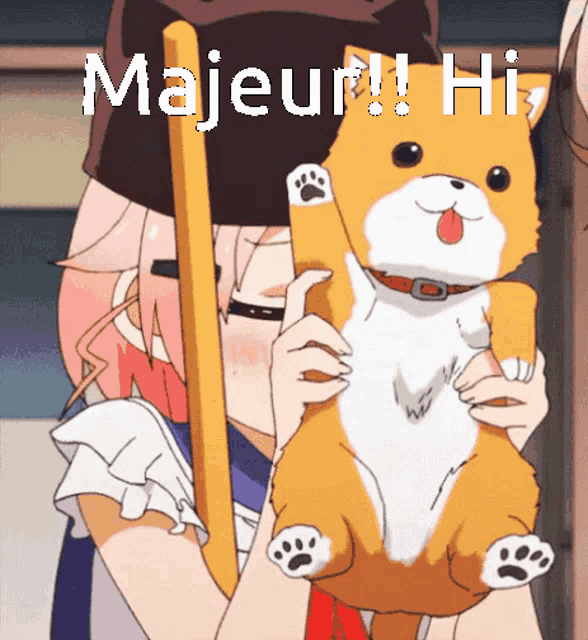 a girl is holding a stuffed animal that says majeur on it