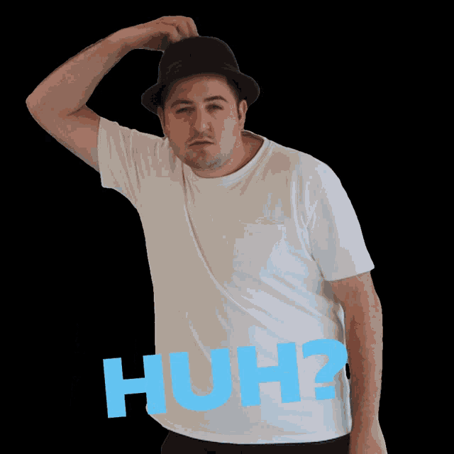 a man wearing a hat and a white shirt has the word huh written in blue letters