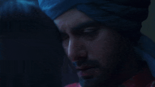 a close up of a woman 's neck with a necklace .