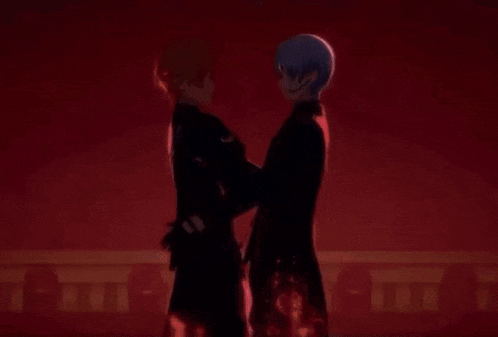 a couple of anime characters are standing next to each other and kissing .