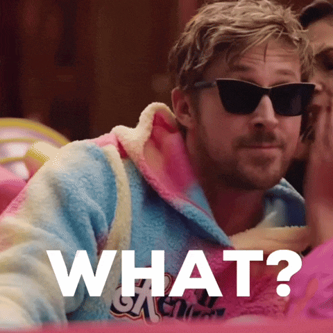 a man wearing sunglasses and a bathrobe says " what "