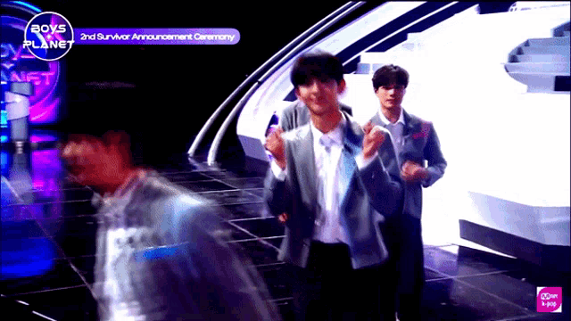 boys planet 2nd survivor announcement ceremony is shown on a television screen