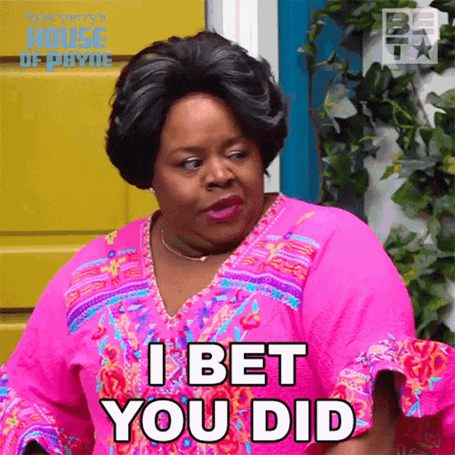 a woman in a pink shirt is saying i bet you did