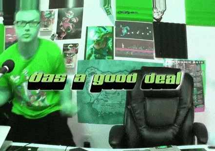 a man in a green shirt is standing in front of a microphone with the words das a good deal behind him