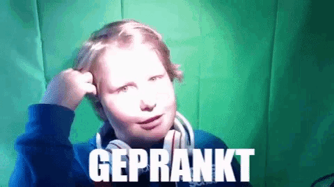 a young boy wearing headphones is making a funny face and the word geprankt is on the green screen behind him