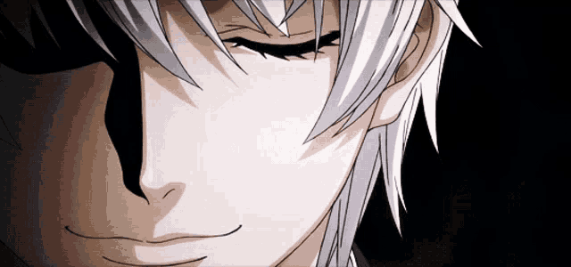 a close up of a person with white hair