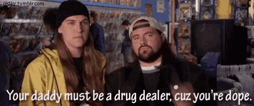 two men standing next to each other with the words " your daddy must be a drug dealer "