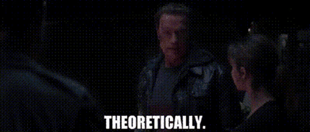 a man and a woman are standing next to each other in a dark room and the man is saying `` theoretically '' .