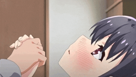 a girl is praying with her hands folded in front of her face