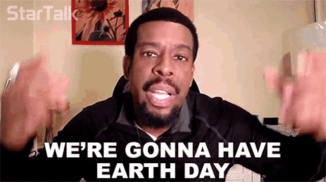 a man says we 're gonna have earth day with his hands in the air