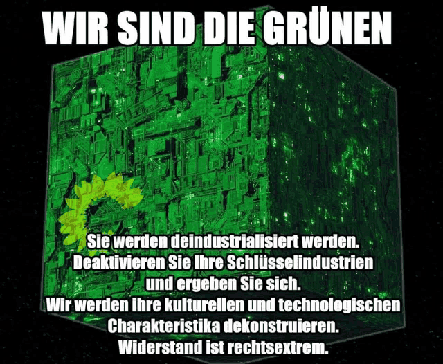 a green cube with the words wir sind die grunen written on it
