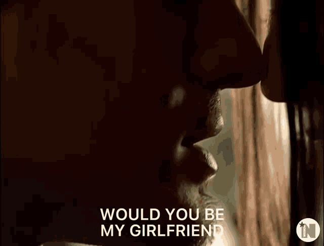 a close up of a person 's face with the words would you be my girlfriend