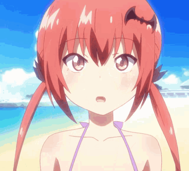 a girl with red hair and a bat on her head stands on a beach