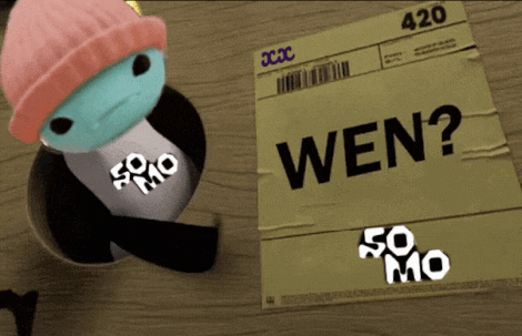 a piece of paper that says wen on it next to a stuffed animal
