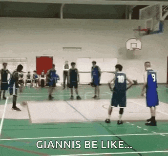 a group of young men are playing basketball on a court and one of them is wearing a blue jersey with the number 10 on it .