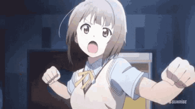 a girl in a school uniform is standing in a dark room with her arms outstretched and her mouth open .