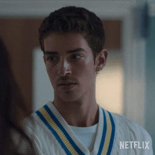 a close up of a man 's face with a netflix logo in the lower right corner